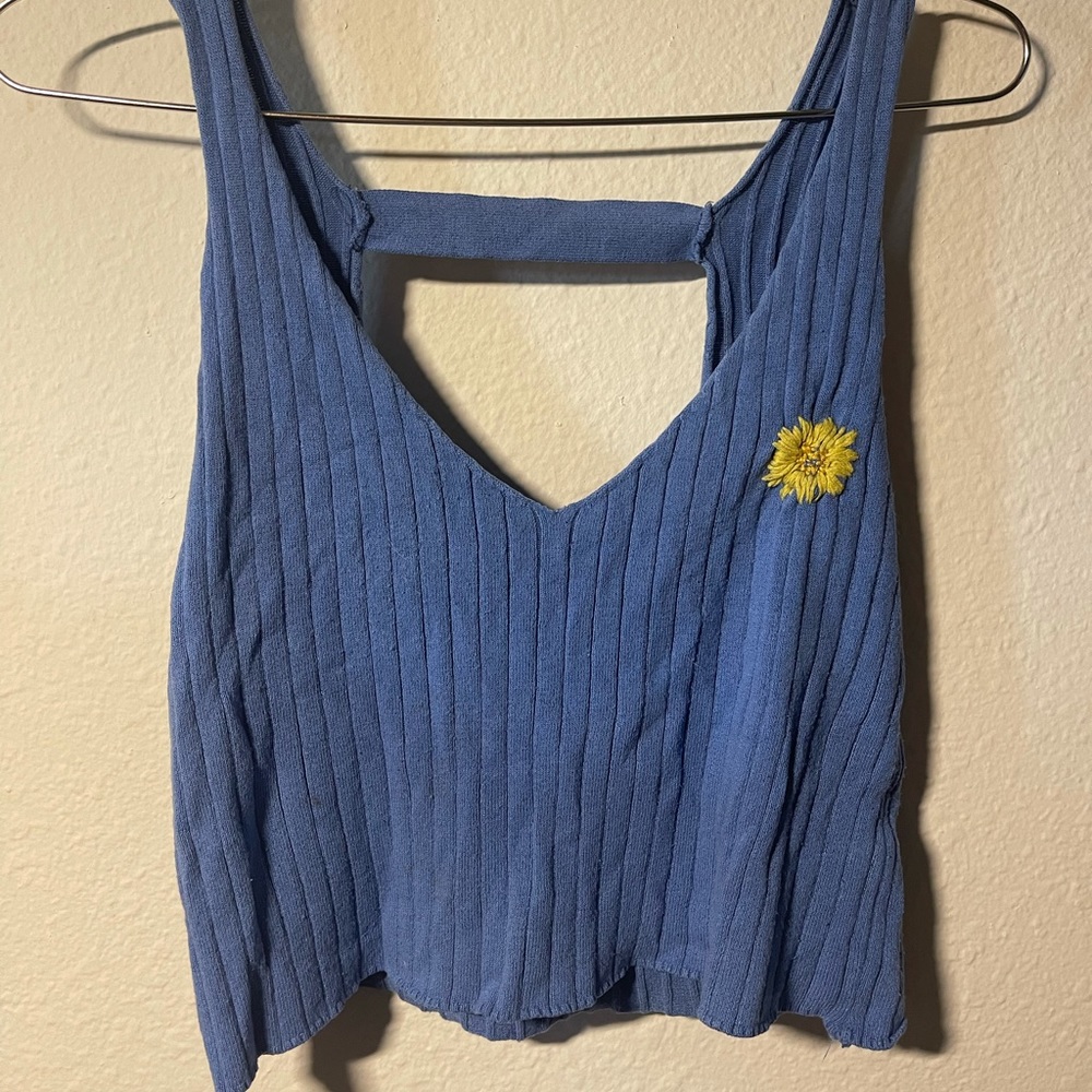 Blue tank top with hand embroidered flower